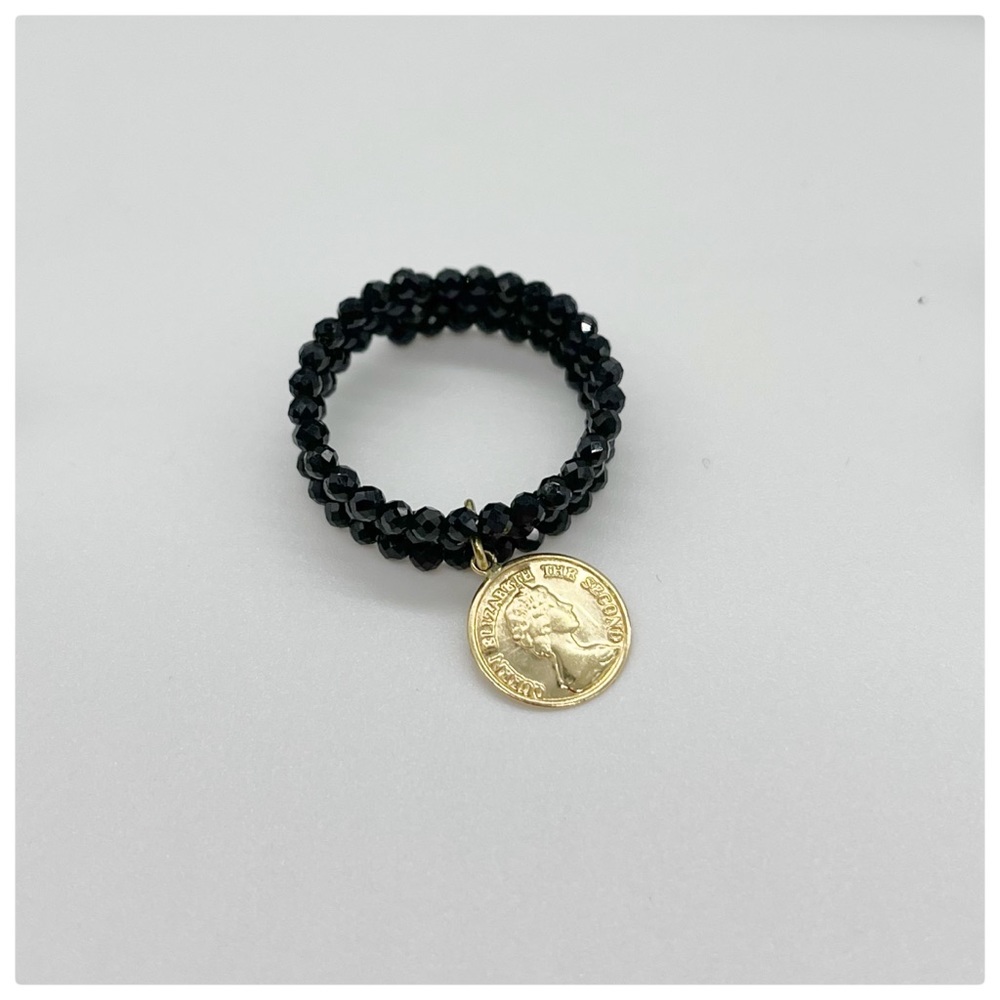Black Spiral Spinel with 18K yellow gold Coin Ring